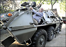 George Hopkins of Linthicum climbs aboard his 1964 Czech Tatra OT-64 amphibious armored fighting vehicle. Hopkins is currently trying to get the 15-ton behemoth in working order for upcoming events that feature old military vehicles. He’s a member of a regional club called the Washington Area Collectors/Blue & Gray Military Vehicle Trust.